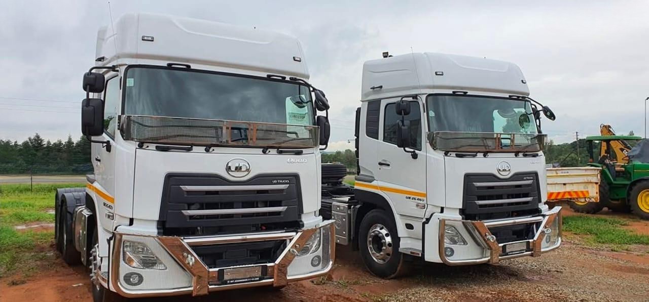 Trucks carrying freight parked side by side - NickJak Logistics